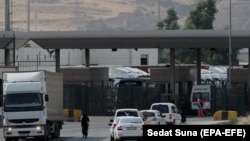 Trucks are pictured after crossing the border between Iraq and Turkey.