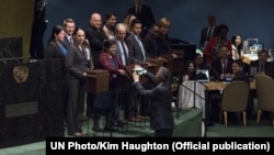 A delegate casts his country’s ballot during the General Assembly’s election of 15 members to the UN Human Rights Council in New York on October 16.