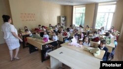 Armenia - First-grade students at a school in Yerevan on the first day of the academic year 2014-2015, 1Sep2014. 