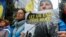 People attend a protest against the ongoing Russian full-scale invasion of Ukraine on the day of a European Union leaders summit in Brussels on October 26.