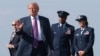 US President Trump disembarks Air Force One at Ellington Field Joint Reserve Base in Houston on August 27.