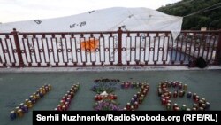 З позовом до суду зверталась вдова загиблого комндира екіпажу літака Олександра Білого