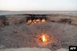 A photo taken in June showing isolated flames within the Darvaza crater