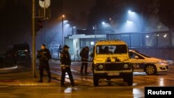 Police guard the entrance to the U.S. Embassy building in Podgorica, Montenegro, on February 22.