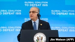 Iraqi Foreign Minister Mohammed Ali al-Hakim speaks at a gathering of foreign ministers aligned toward the defeat of Islamic State at the State Department in Washington, February 6, 2019