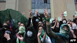 Opposition supporters demonstrate at Tehran University in December 2009.