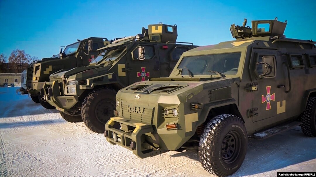 Armored vehicles made by the Ukrainian private joint-stock company AvtoKrAZ, which is one of five companies that Ukraine's National Security Council has commandeered under martial law.