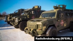 Armored vehicles made by the Ukrainian private joint-stock company AvtoKrAZ, which is one of five companies that Ukraine's National Security Council has commandeered under martial law.