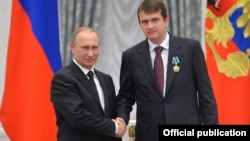 Иван Таврин, медиаменеджер, с Владимиром Путиным на вручении наград в Кремле, 21 мая 2015 