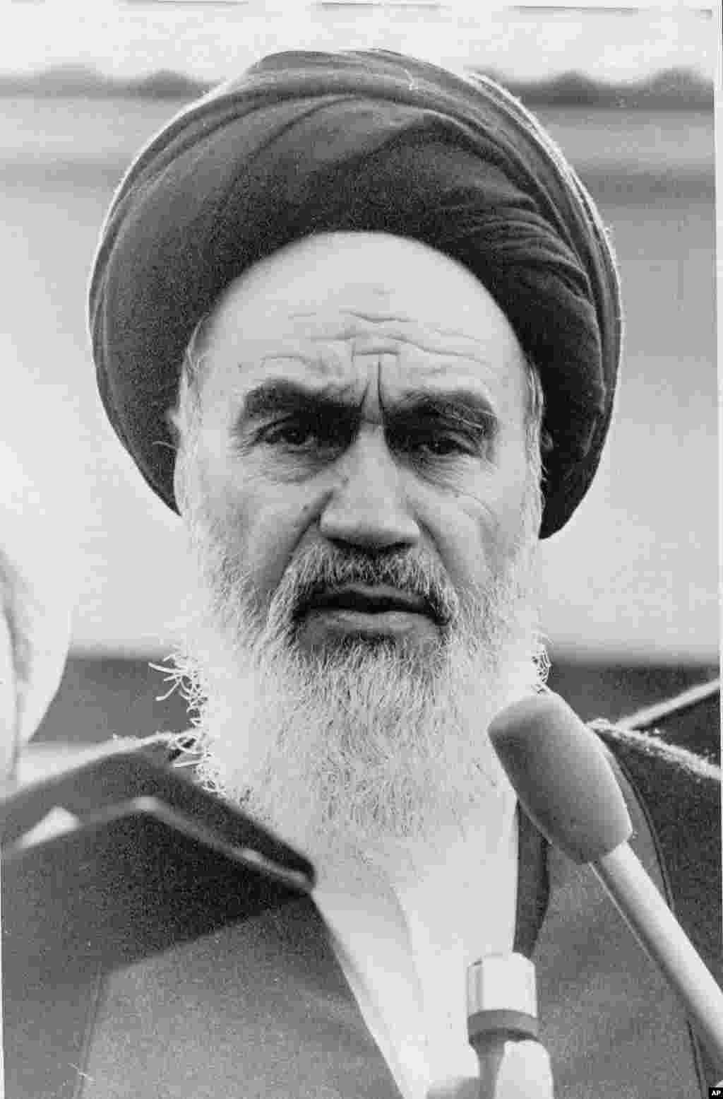 Ayatollah Ruhollah Khomeini, Iran&#39;s exiled religious leader, speaks on January 25, 1979, at a news conference following morning prayers in Paris.&nbsp;Through an interpreter, he told international journalists that he was postponing his return to Tehran because of the Iranian Army&#39;s closure of the airports.