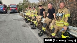 Echipa de intervenție într-un moment de respiro, într-o imagine difuzată de IGSU pe 10 august.