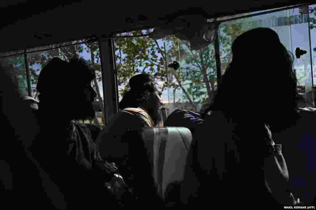 Taliban prisoners sit inside a vehicle during their release from Bagram prison.