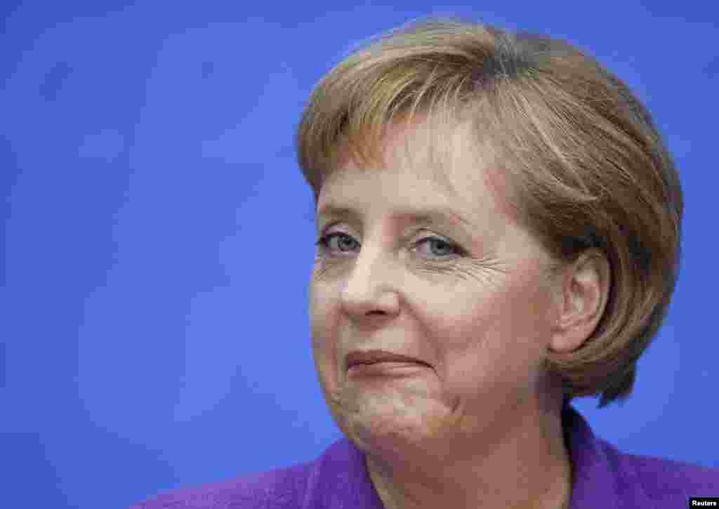 Angela Merkel, German chancellor and leader of the conservative Christian Democratic Union party (CDU), smiles as she addresses a news conference at the CDU party headquarters in September 2009 in Berlin.