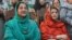 Kulsoom Nawaz (left) and Maryam Nawaz attend the election campaign meeting in Lahore in May 2013. 