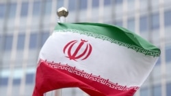 The flag of Iran flutters in the wind outside of the IAEA headquarters during the International Atomic Energy Agency IAEA's Board of Governors meeting at the agency's headquarters in Vienna, Austria, on November 20, 2024.