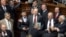 Ukraine -- Parliament Speaker Arseniy Yatsenyuk (C) speaks with lawmakers loyal to prime minister who block speaker's chair, Kyiv, 13May2008