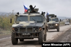 Russian peacekeepers have begun to leave Nagorno-Karabakh, more than a year ahead of schedule.