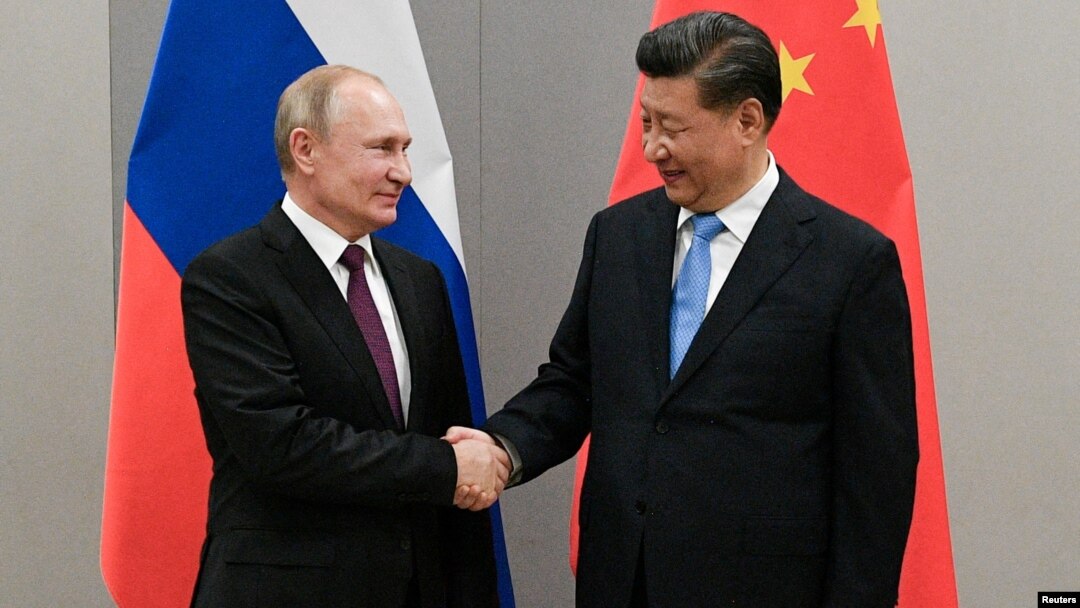 Chinese leader Xi Jinping (right, with Russian President Vladimir Putin) called the U.S.S.R.'s dissolution “a profound lesson” that many China watchers say has helped fuel Beijing’s tough crackdowns and desire for control over varying aspects of life.