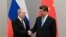 Vlagyimir Putyin és Hszi Csin-ping a BRICS-csúcstalálkozón Brazíliavárosban 2019. november 13-án