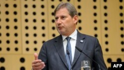 Slovenia -- EU Enlargement Commissioner Johannes Hahn addresses a press conference in Brdo near Kranj, April 23, 2015