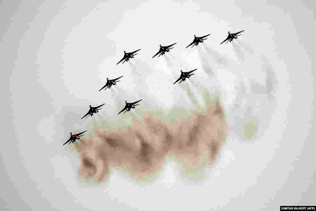 A Russian Air Force aerobatics team performs at an air show in Zhukovsky, outside Moscow.