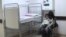 Armenia -- A child suffering from a respiratory virus and his mother wait in the hallway of Arabkir hospital, 8Jan2016