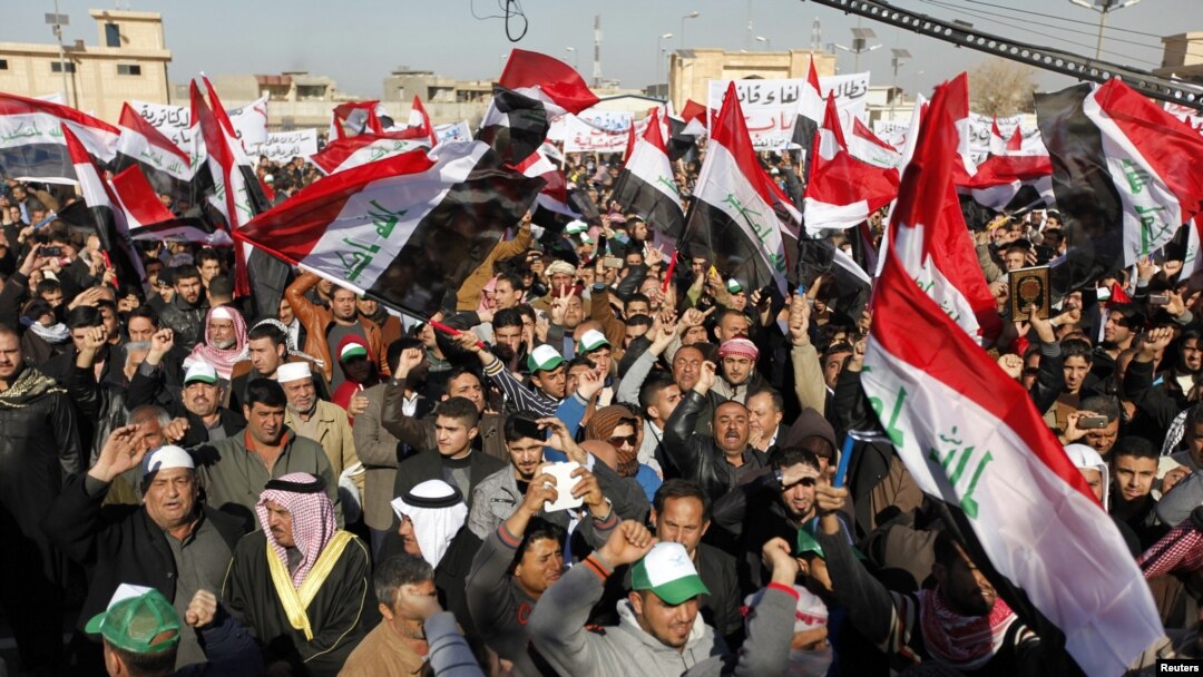 Sunni Muslims take part in an antigovernment demonstration at the Sunni Umm Al-Qura Mosque in Baghdad on January 11.