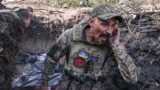 Artem, a 40-year-old Ukrainian commander, shouts a warning before his artillery team fires toward Russian positions near Pokrovsk in early October.<br />
&nbsp;