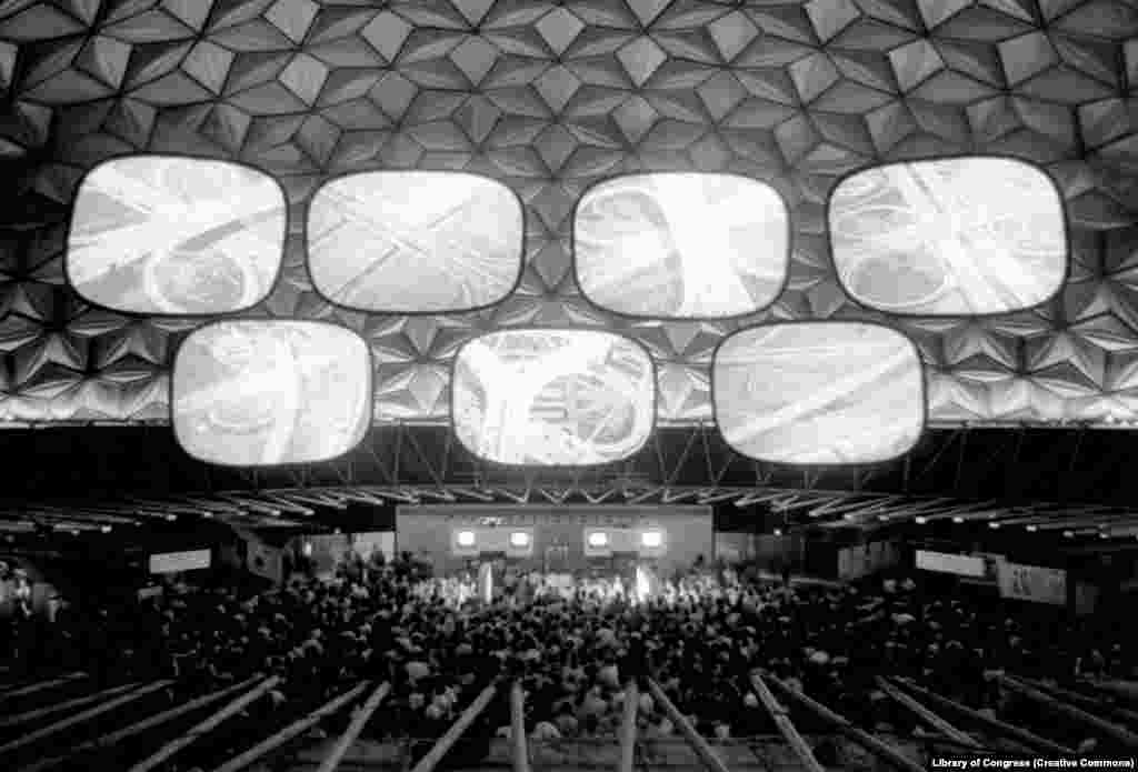 Huge screens suspended inside a geodesic dome display a film called Glimpses Of The U.S.A. The American exhibition was given just $3.5 million in funding. A member of the design team summed up the frantic preparations for the event: &ldquo;Panics and problems. No funds. No budget. No program.&rdquo;