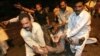 A casualty of the Karachi blasts is carried off