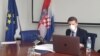 Здравко Марич, финансовият министър на Хърватия, която в момента председателства съвета на ЕС, води заседанието от Загреб, където сградата на министерството пострада сериозно при земетресението в понеделник
