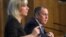 Russian Foreign Minister Sergei Lavrov, accompanied by Russian Foreign Ministry spokeswoman Maria Zakharova, answers reporters' questions in Moscow on January 15.