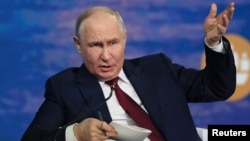 Russia's President Vladimir Putin attends the St. Petersburg International Economic Forum on June 5.