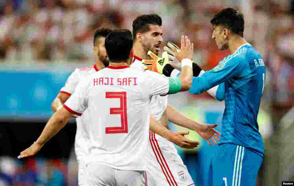 Soccer Football - World Cup - Group B - Iran vs Portugal - Mordovia Arena, Saransk, Russia - June 25, 2018 Iran's Saeid Ezatolahi with Alireza Beiranvand and team mates REUTERS/Matthew Childs