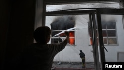 Russian drones hit the Ukrainian city of Zaporizhzhya early on June 14.