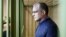 Paul Whelan stands in the courtroom cage after a ruling regarding extension of his detention in Moscow last month.