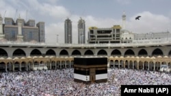 Muslim pilgrims congregate around the Kaaba, the cubic building at the Grand Mosque, ahead of the Hajj pilgrimage in the Muslim holy city of Mecca, on August 8.