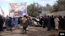 The site of a car bomb attack in Karbala on February 5