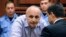Former Georgian Prime Minister Vano Merabishvili attends a preliminary hearing of his case at the court in Kutaisi on May 22.
