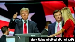 U.S. President Donald Trump, then on the campaign trail, on stage with Paul Manafort, his former campaign chairman, on July 21, 2016.