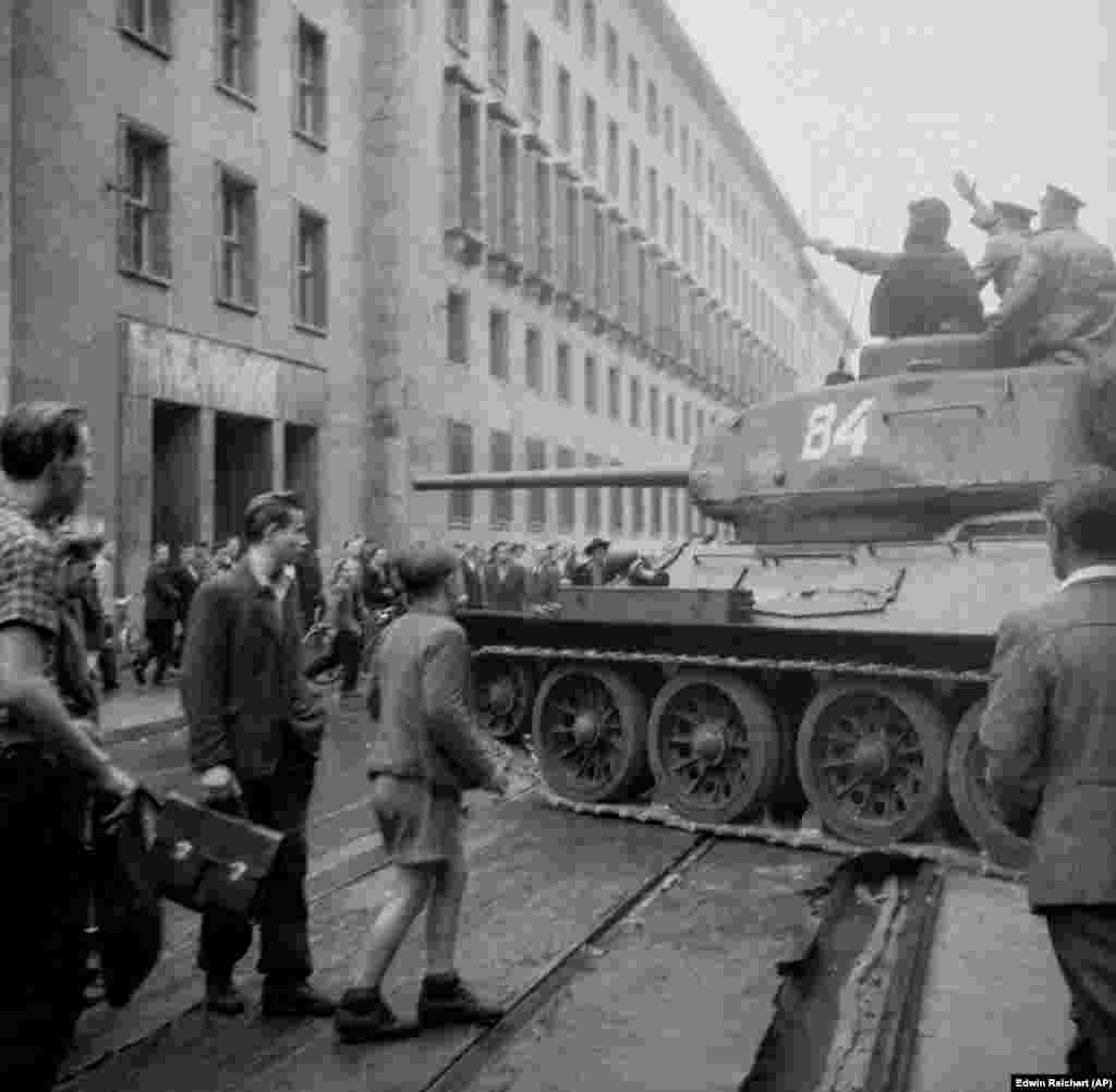 A Soviet T-34 amid a&nbsp;crowd of demonstrators in East Berlin during the East German uprising, June 17, 1953.