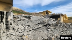 Destroyed buildings of an Iranian Kurdish group in Iraq's Kurdistan region that were reportedly hit by an Iranian drone in early March.