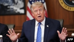 US President Donald Trump speaks during a Cabinet meeting at Camp David in Maryland on July 31.