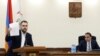 Armenia - Opposition member Grigor Yeritsian (L) addresses a session of the Yerevan city council chaired by Mayor Tigran Avinian, September 10, 2024. 