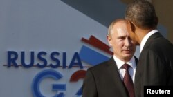 Президент России Владимир Путин (слева) и президент США Барак Обама.