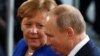 German Chancellor Angela Merkel (left), in talks with Russian President Vladimir Putin in January 2020, will retire from politics after elections next month.