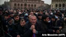 ARMENIA -- Supporters of Armenian Prime Minister Nikol Pashinian listen to his speech during a rally on Republic Square in downtown Yerevan, March 1, 2021