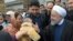 Iranian President Hassan Rohani visits flood-affected villages around the city of Aq-Qala in Golestan province, March 27, 2019