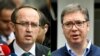 This combination of file photographs created on July 6, 2020 shows (L) newly elected Kosovo Prime Minister Avdullah Hoti as he speaks to the media in Pristina on June 3, 2020 and (R) Serbian President Aleksandar Vucic addressing the media outside a pollin