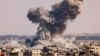 Smoke rises above Rafah during an Israeli bombardment of the southern Gaza Strip on October 19.